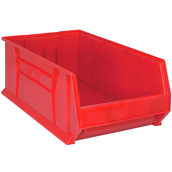 A Quantum red plastic bin with no lid.