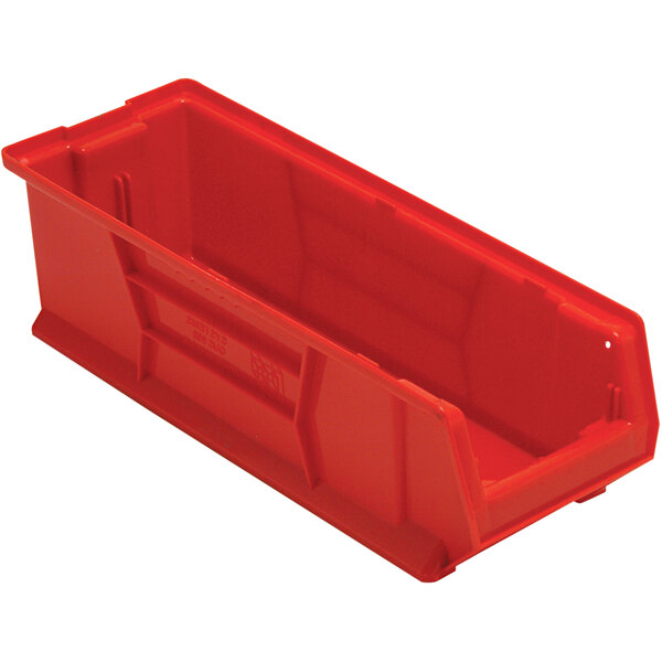 A Quantum red plastic bin with a handle.