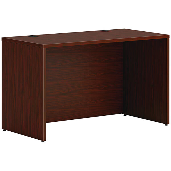 A traditional mahogany HON credenza shell with a dark wood top.