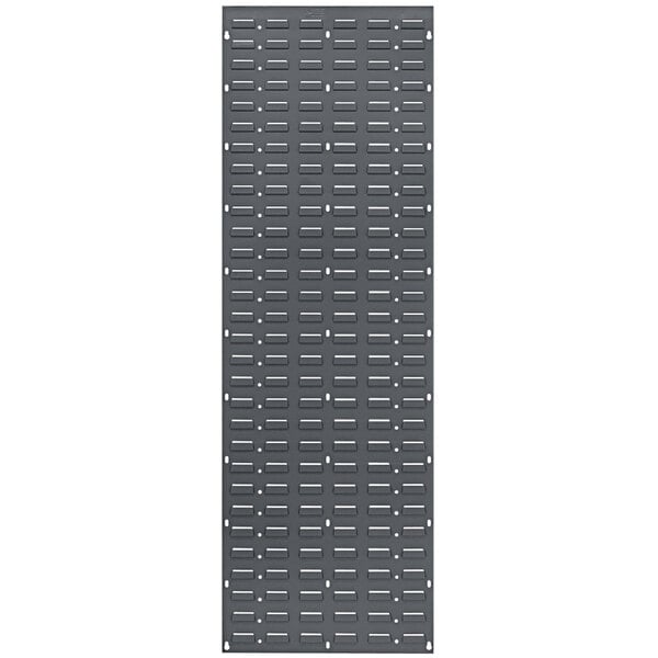 A rectangular grey steel panel with small rectangular holes.