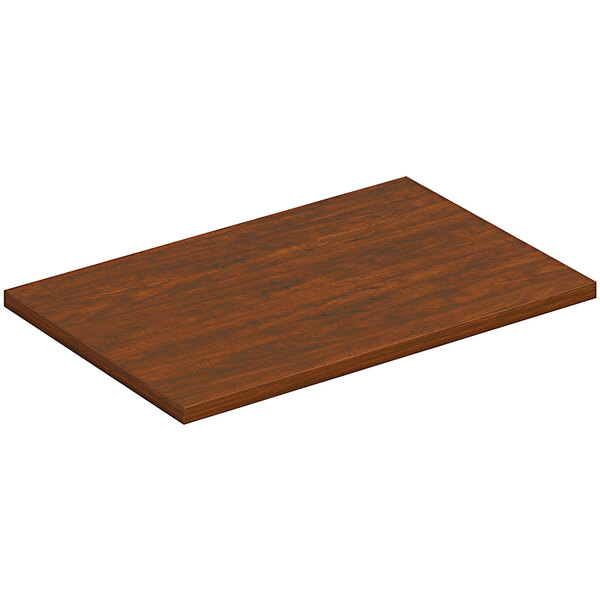 A brown rectangular wooden table top.