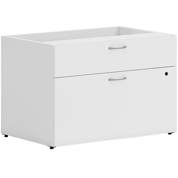 A white HON personal credenza with 2 drawers.