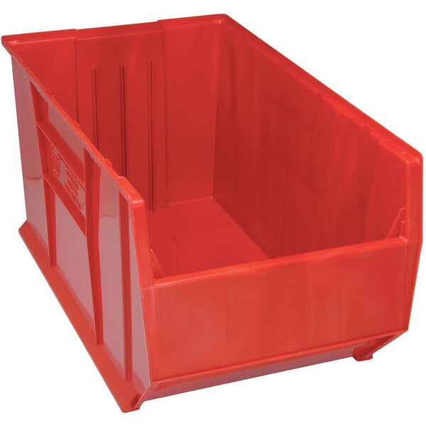 A Quantum red plastic storage bin.