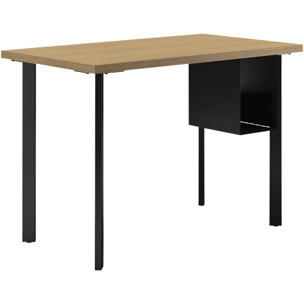 A HON natural recon and black laminate desk with U-storage shelves.