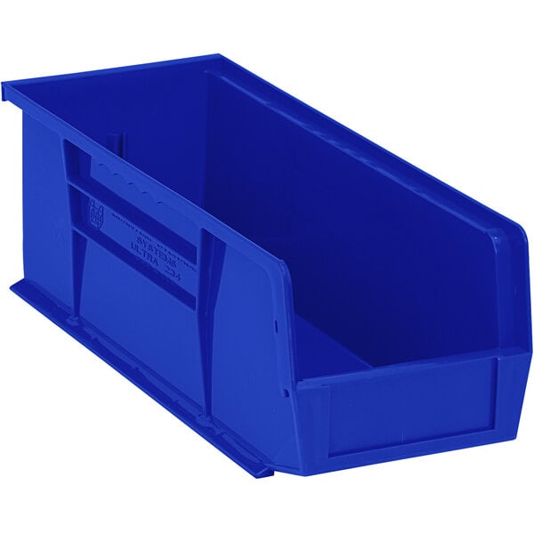 A blue Quantum hanging bin with a handle.