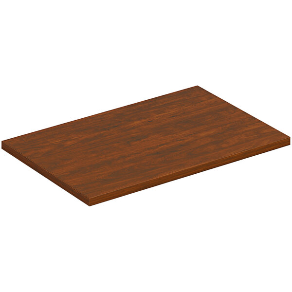 A brown wooden rectangular table top.
