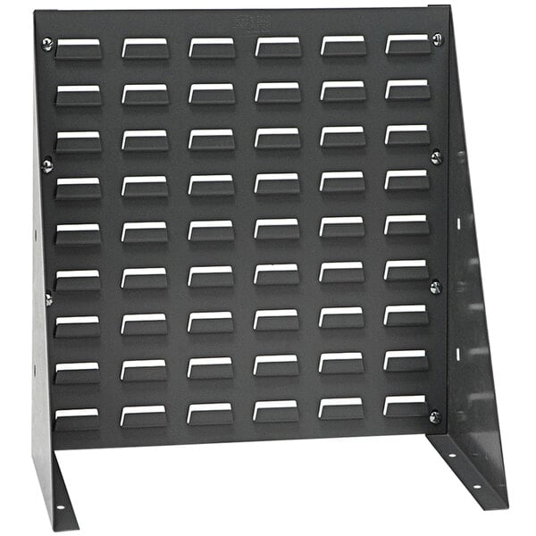 A grey steel bench rack with many holes.