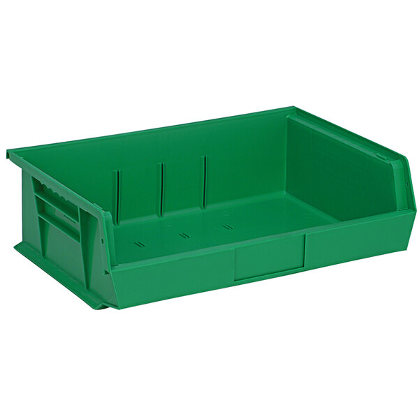 A green plastic Quantum hanging bin with two compartments.