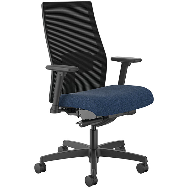 A black HON mid-back task chair with navy fabric seat and black mesh back.