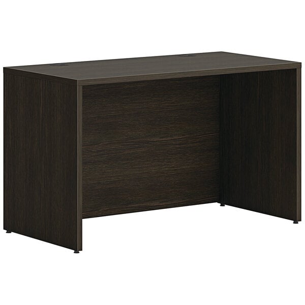 A black HON Java Oak laminate desk with dark wood top.