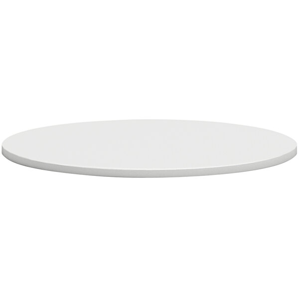 A white round HON conference table top.