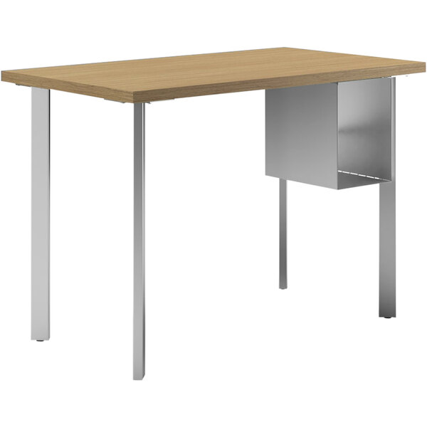 A HON natural recon wood desk with metal U-storage shelves and legs.