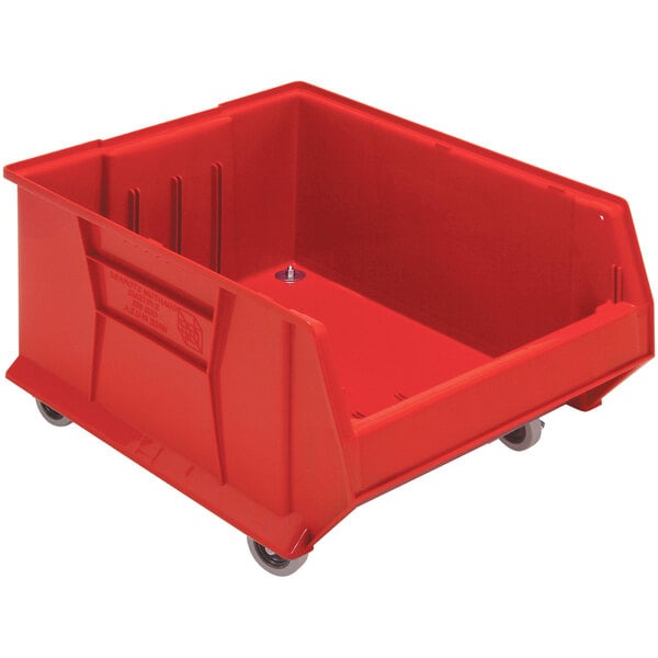 A Quantum red plastic storage bin with wheels.