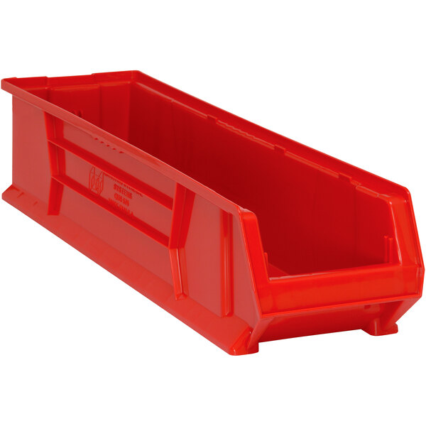 A Quantum red plastic bin with a handle.