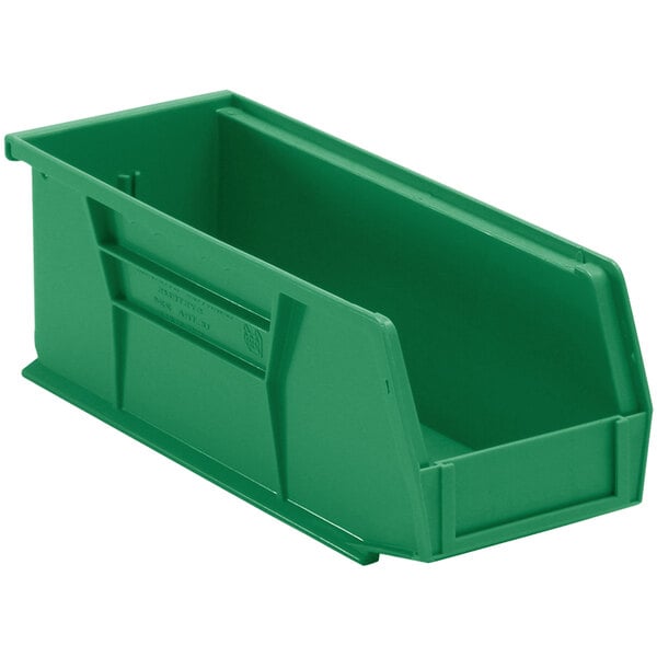 A green plastic Quantum hanging bin with a handle.