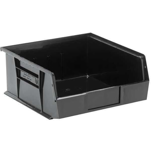 A Quantum black plastic hanging bin with a handle.