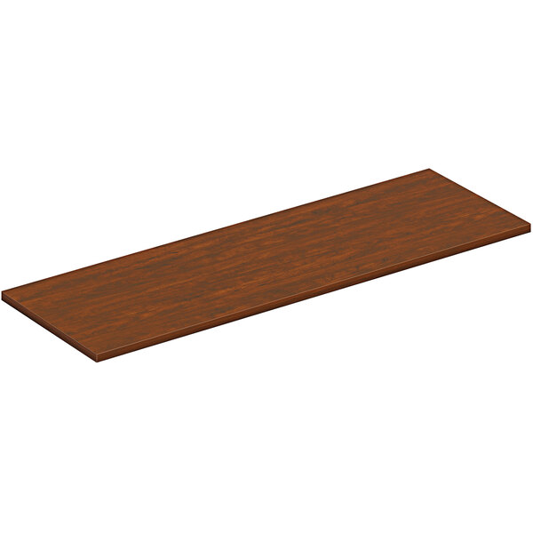 A brown rectangular wood surface with a wood grain.