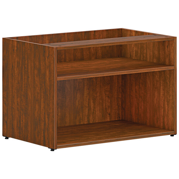 A HON russet cherry wooden low open storage credenza with shelves.