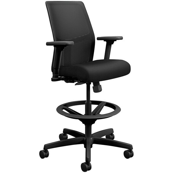 A black HON Ignition low-back office chair with wheels.