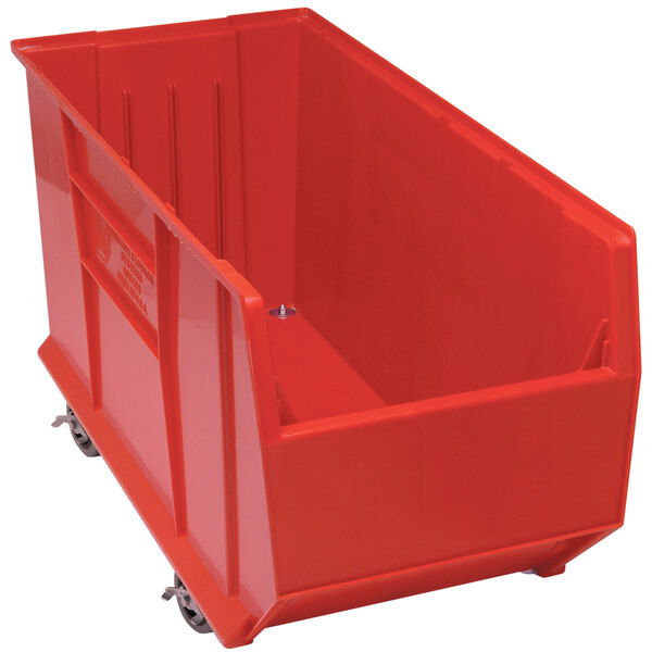 A Quantum red plastic storage bin with wheels.