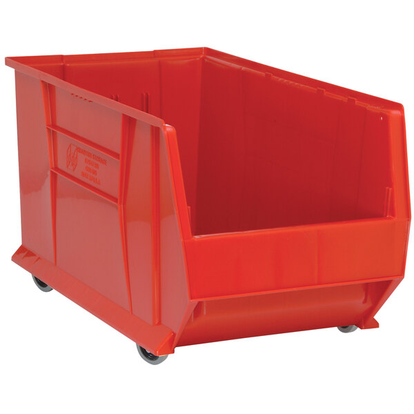 A Quantum red plastic storage bin with wheels.