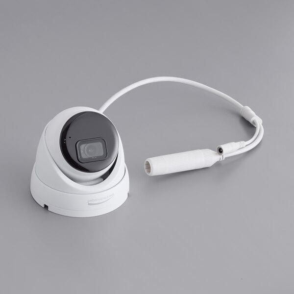 A white Speco Technologies IP turret camera with a cable attached to it.