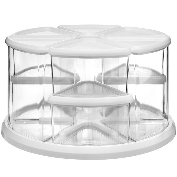 A white plastic rotating carousel with four clear compartments.