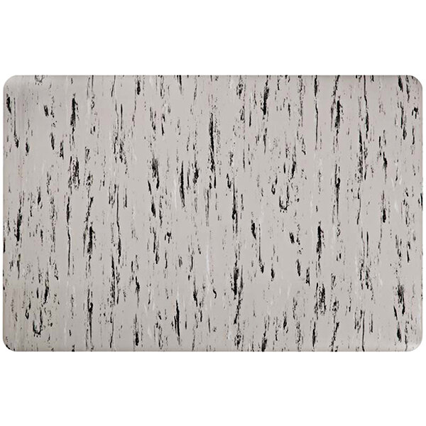 A Deflecto gray and white marble patterned standing mat.