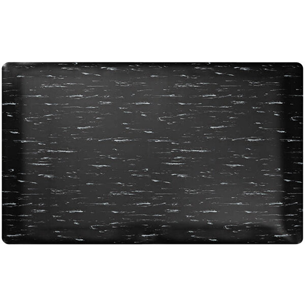 A black rectangular standing mat with white specks on the surface.