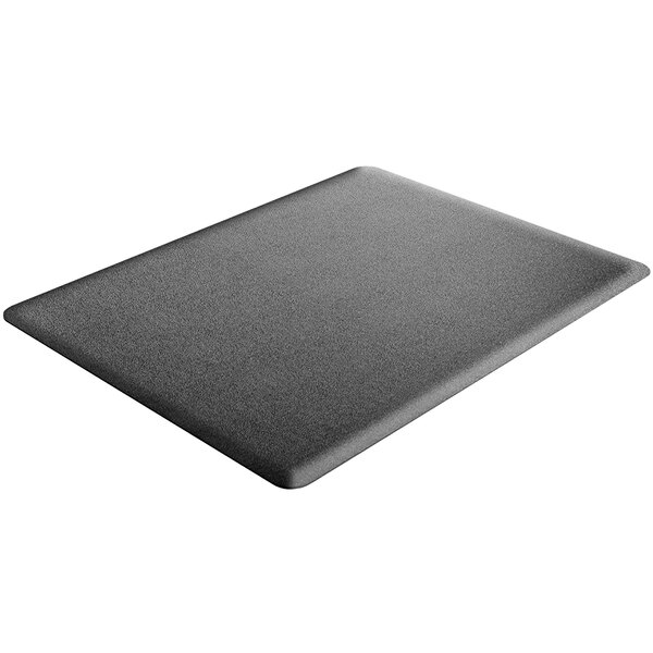 A black rectangular Deflecto sit/stand mat with a gray surface.