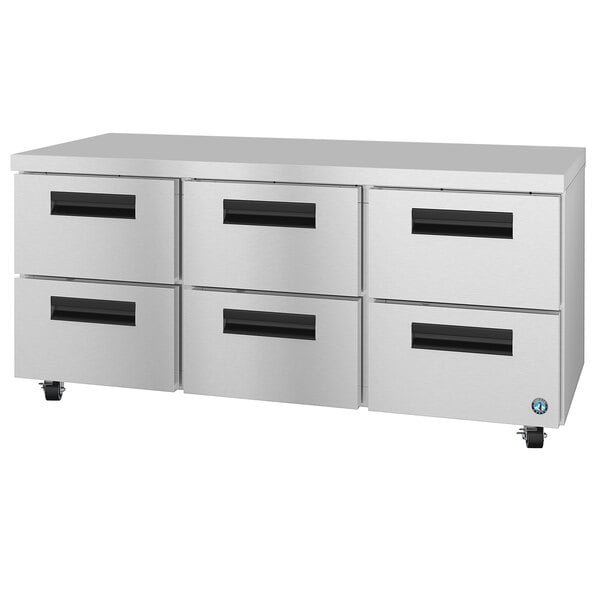 A stainless steel Hoshizaki undercounter refrigerator with six drawers.