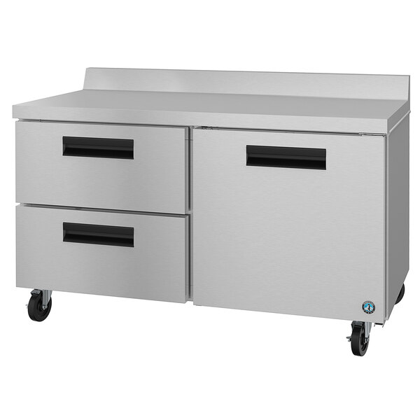 A large stainless steel Hoshizaki worktop refrigerator with drawers.