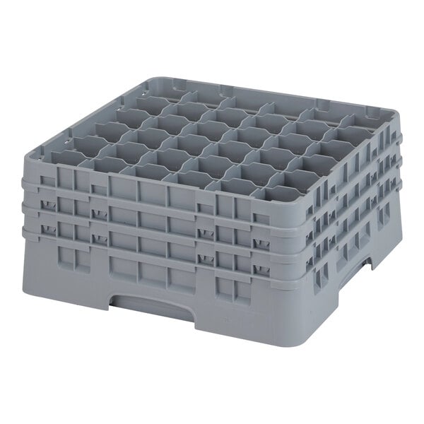 A grey plastic Camrack with 36 compartments for 7 3/4" glasses.