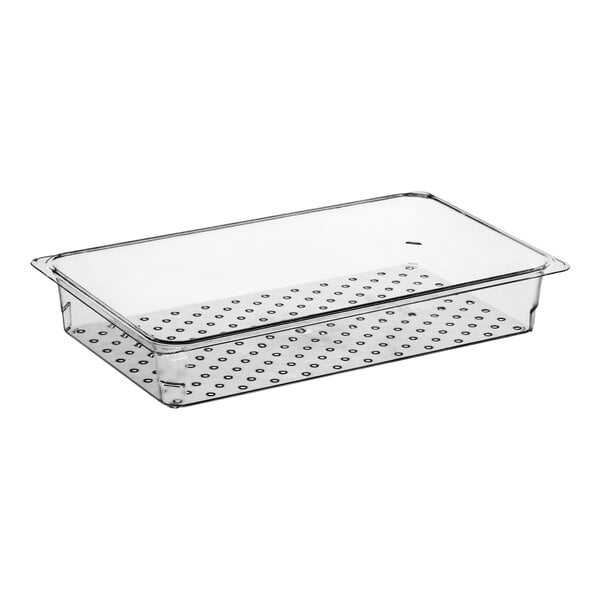 A clear plastic pan with holes in it.