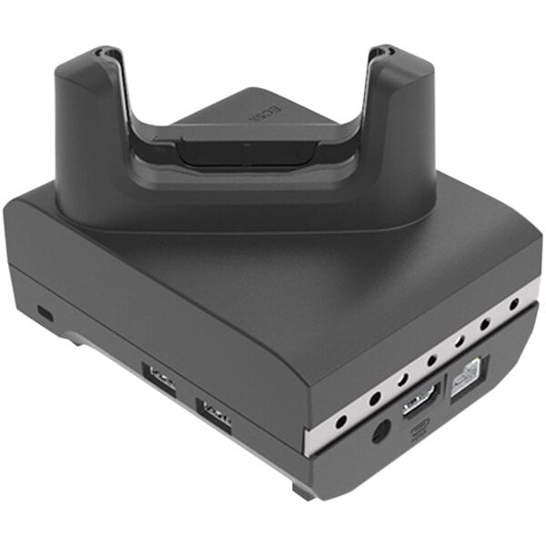 A close-up of a black Zebra Workstation docking cradle with two wires attached to it.