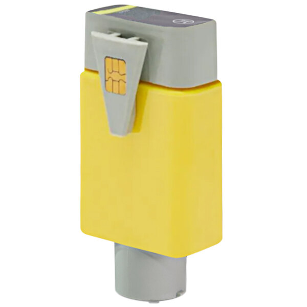 A Primera yellow ink tank with a chip on a chip card.