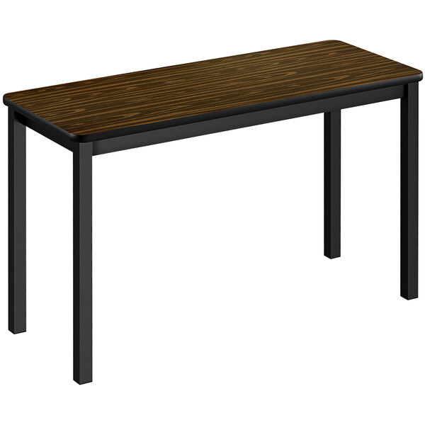 A Correll walnut rectangular lab table with black legs.