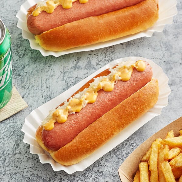 Two Nathan's Famous beef hot dogs with mustard on a white plate.