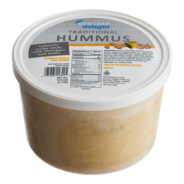 A 3.75 lb. tub of Grecian Delight Traditional Hummus.