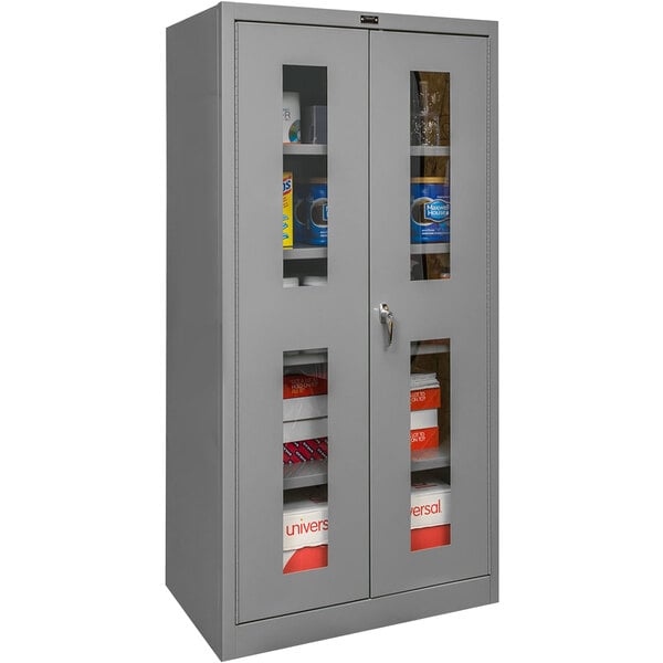 A Hallowell gray storage cabinet with shelves and safety-view doors.