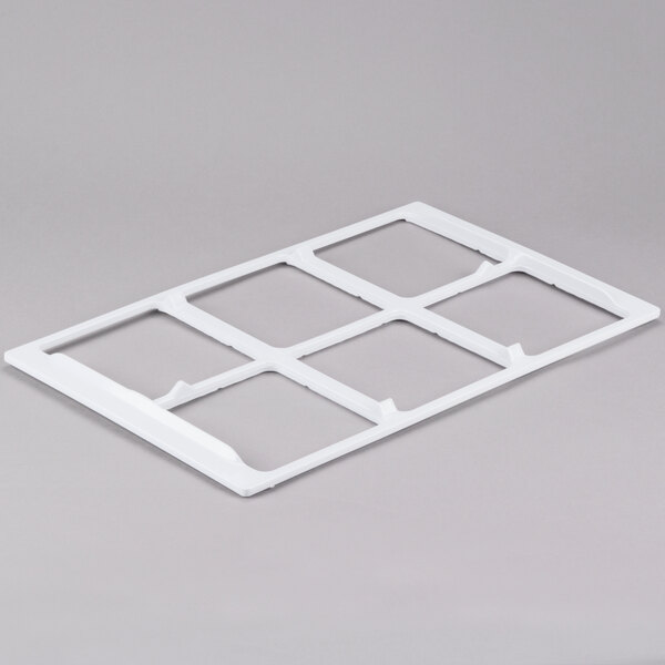 A white melamine adapter plate with six square crock cut-outs.