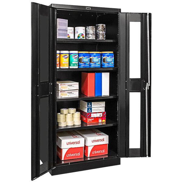 A black metal Hallowell storage cabinet with shelves full of products.