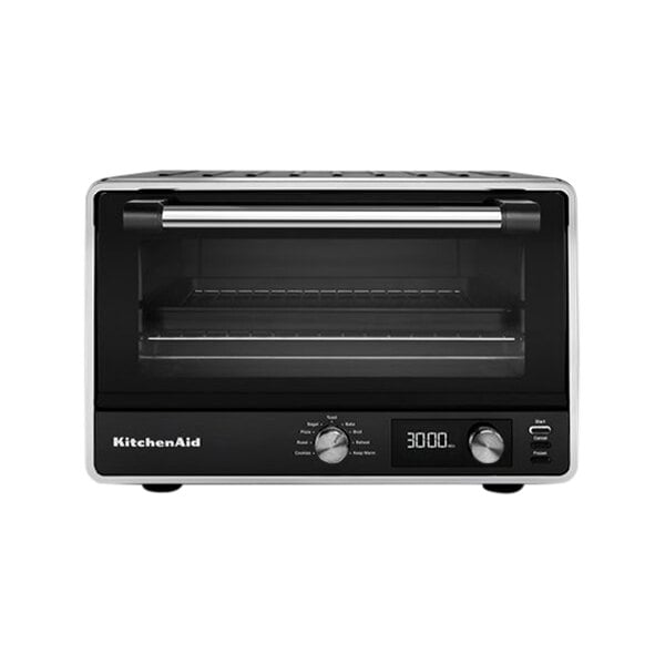 A black KitchenAid digital countertop oven with a glass door and shelves.