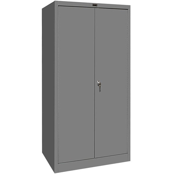 A gray metal Hallowell wardrobe cabinet with solid doors and a lock.