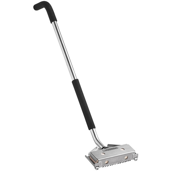 A long metal Texas Brush with a stainless steel and black handle.