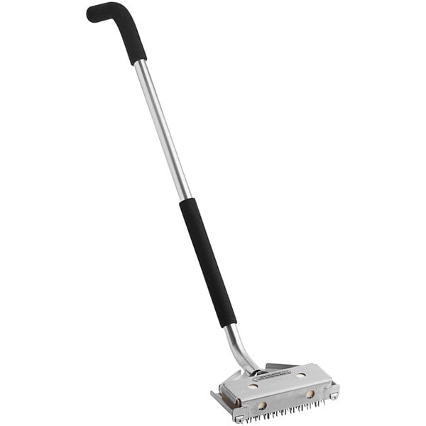 A long silver and black Texas Brush Smart Grill flat wire brush with a stainless steel handle.