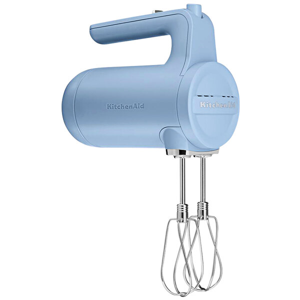 A blue KitchenAid cordless hand mixer with a handle.