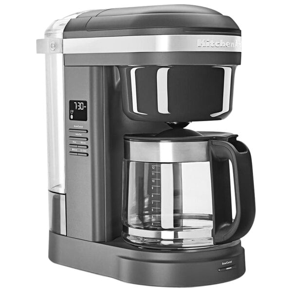 A KitchenAid gray coffee maker with a glass pitcher and black base.