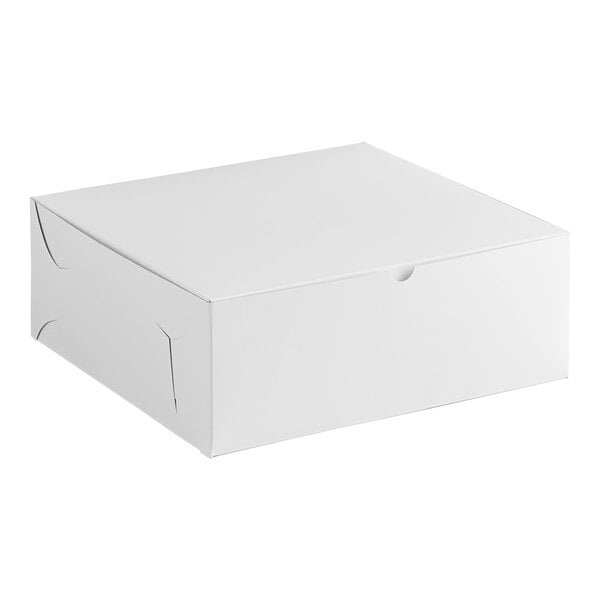A plain white cardboard bakery box with a closed lid.