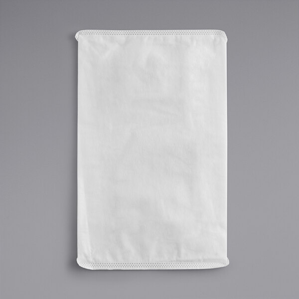 A white cloth bag with a Makita logo on a gray surface.